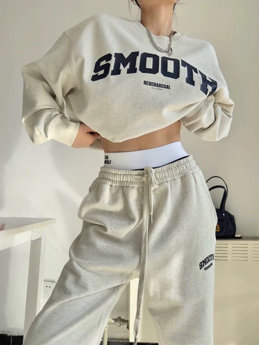 LS Fashion women's jogger set in light gray featuring a cropped sweatshirt and drawstring pants