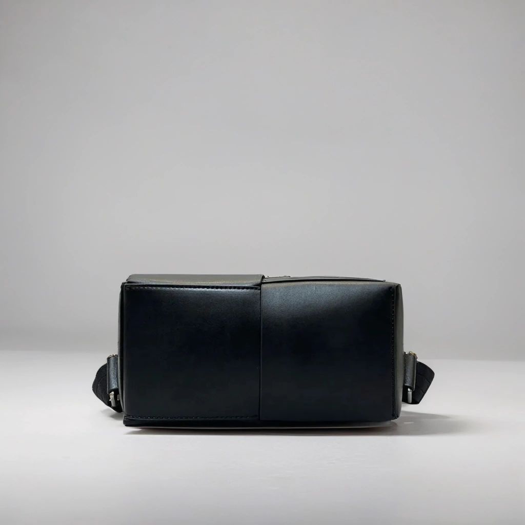 LS Fashion black leather rucksack shown from bottom view with smooth leather finish